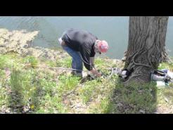 John Garrett catches a trout, 55-13