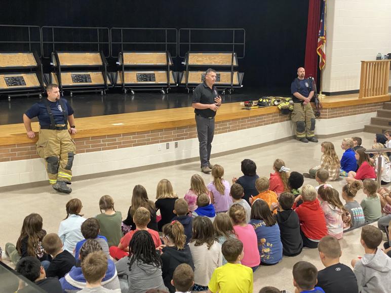 Fire fighters Tyler Delong-Clem, John Kinn (fire chief) and John Bowers