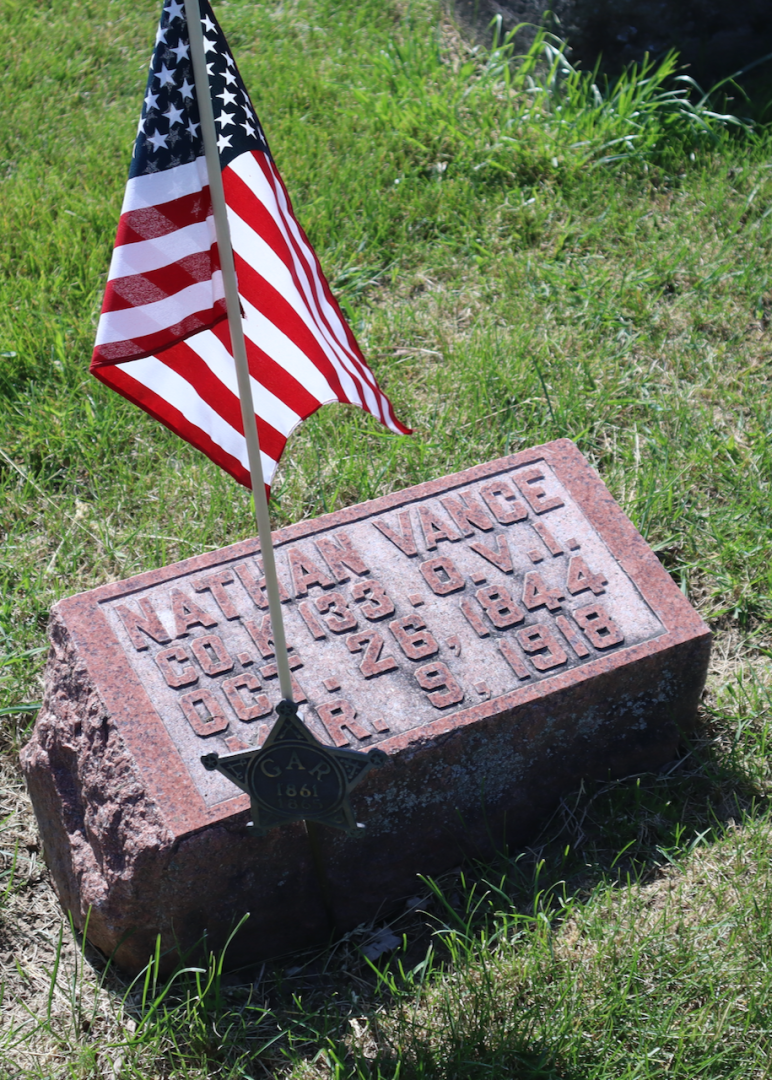 Maple Grove cemetery grave decorated for Memorial Day
