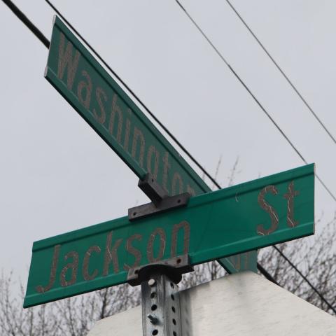 Green signs being replaced