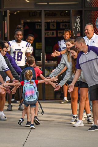 Bluffton University athletes started High-Five Fridays in spring 2022