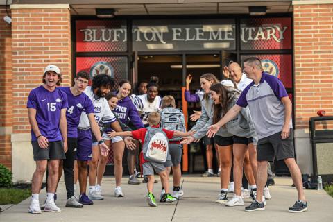 Bluffton University athletes greet Bluffton Elementary students