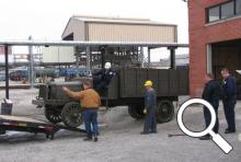 Unloading the Allen County Museum's 1918 Gramm Bernstein Liberty truck at the Lima Refinery restoration is underway.