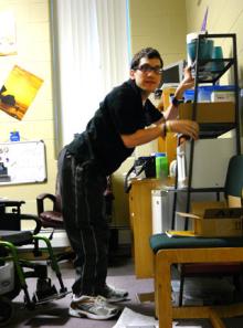 Bluffton University student Marcus Meyers in his dorm room