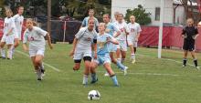 Here's action from BHS-Bath game on Sept. 11.  The Lady Pirates just blocked a corner kick and are after the ball. Carissa Luginbill and Rachel Yoder are in pursuit of the ball. (Tim McCarthy photo)