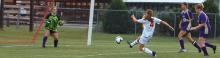 Megan Dulle takes a shot against Ada (Tim McCarthy photo)