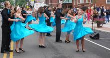 Bluffton High School's Show Choir entertained the crowd at Saturday's arts and crafts show. The choir, directed by Kara Gratz, performed in the morning in front of Citizens National Bank.