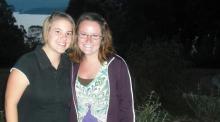 Jill Schlabach (left) and Hanna Mattingly stand at the overlook at their rural homestay in Kapcho