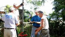 Bob Fett (on right) working on a well in Haiti