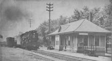 NKP 703 pulls a fast freight through Bluffton toward Bellevue