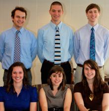 Bluffton University^aEURTMs May Day court are King Kenny Miller (center, back), Queen Leah Roeschley (center, front), senior escort Joel Wildermuth (right, back), senior attendant Mary Good (right, front) and junior chairpersons Alex Woodring (left, back) and Jenna Eshleman (left, front).