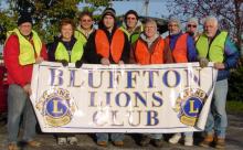 Bill Croft and Vanessa Greer of the Bluffton Lions Club stand with Jerry and Lori Lewis