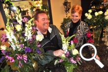 Doug Smith creates a floral arrangement with Renee Smith's assistance - click on image to enlarge
