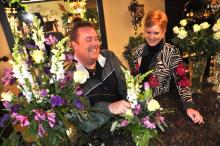 Doug Smith creates a floral arrangement with Renee Smith's assistance - click on image to enlarge