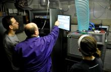 Pete Suter goes over final instructions Monday night on operating the Shannon Theatre's movies digitally