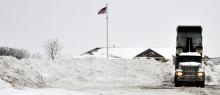 Snow being dumped at the swimming pool