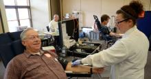 Larry Core donating blood at a drive this past winter