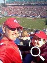 Scott and his youngest daughter, Maddie, at the 2012 OSU vs. Florida Gater Bowl
