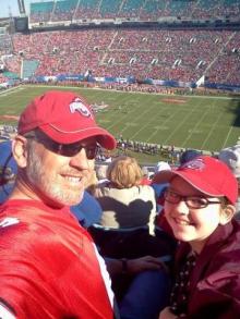 Scott and his youngest daughter, Maddie, at the 2012 OSU vs. Florida Gater Bowl