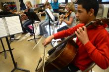 Sixth grade strings rehearse for Friday's event